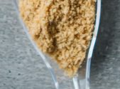Food powder processing waste caused by static charge
